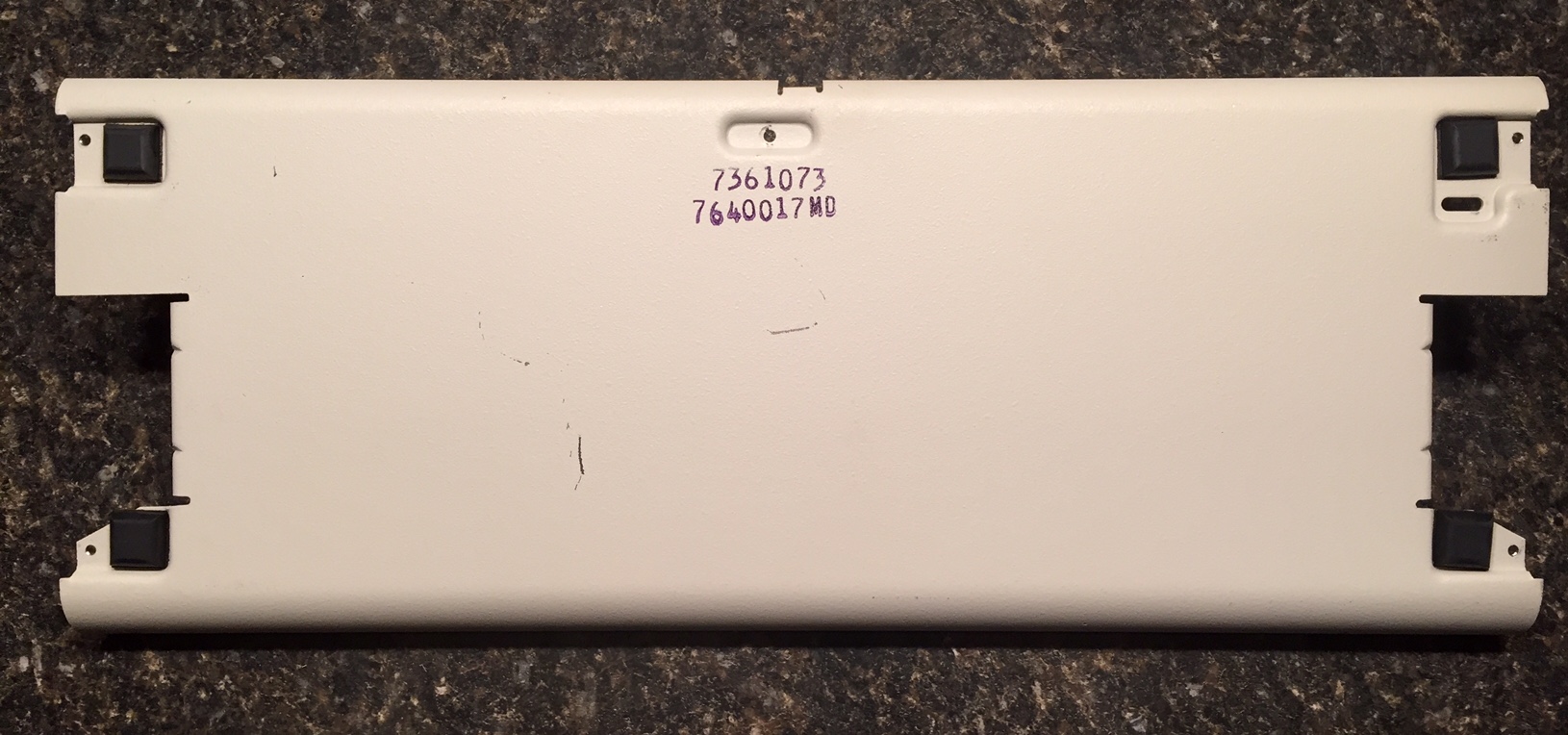 Glare is from the 3 overhead lights