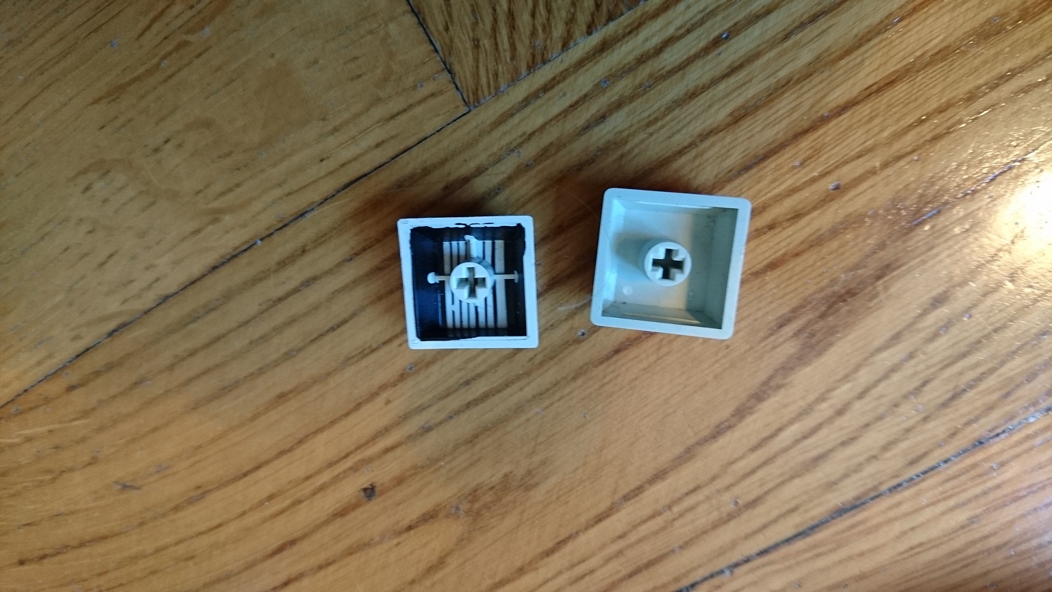 The Key-caps are pad-printed ABS and despite what it might look like, they're not cherry compatible as the + is slightly narrower. (Compared with a MY key cap here)