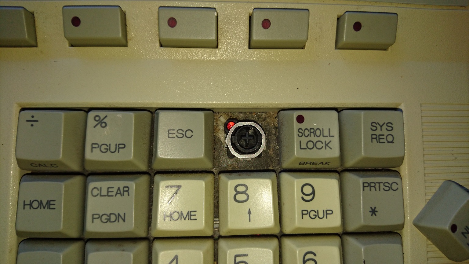 The switch itself with LED (boy its dirty down there). Its a clicky switch with a feeling thats somewhere between a blue alps and a buckling spring. (As in, louder than a blue alps but not as loud as a BS, more Tactile than the alps but not as tactile as a BS etc.)