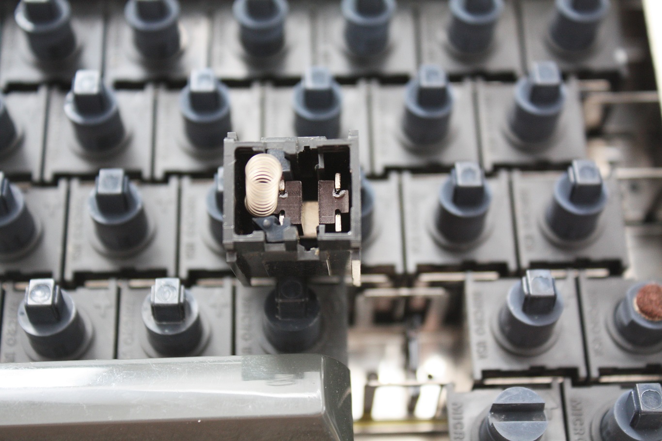 IBM 3277 typewriter keyboard - bottom of key switch removed