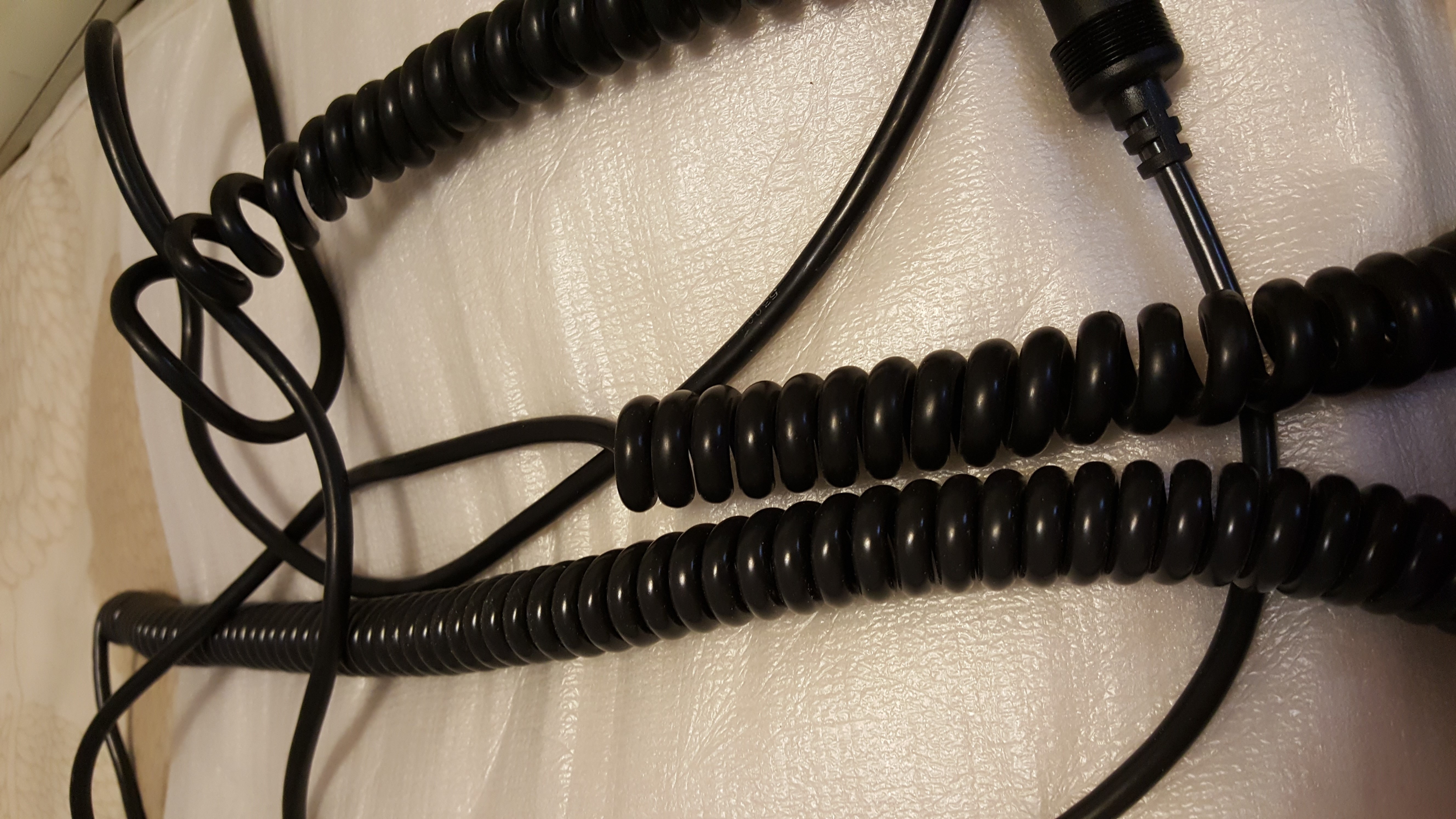 The black model F cable is also slightly thicker than the SDL to DIN cable.