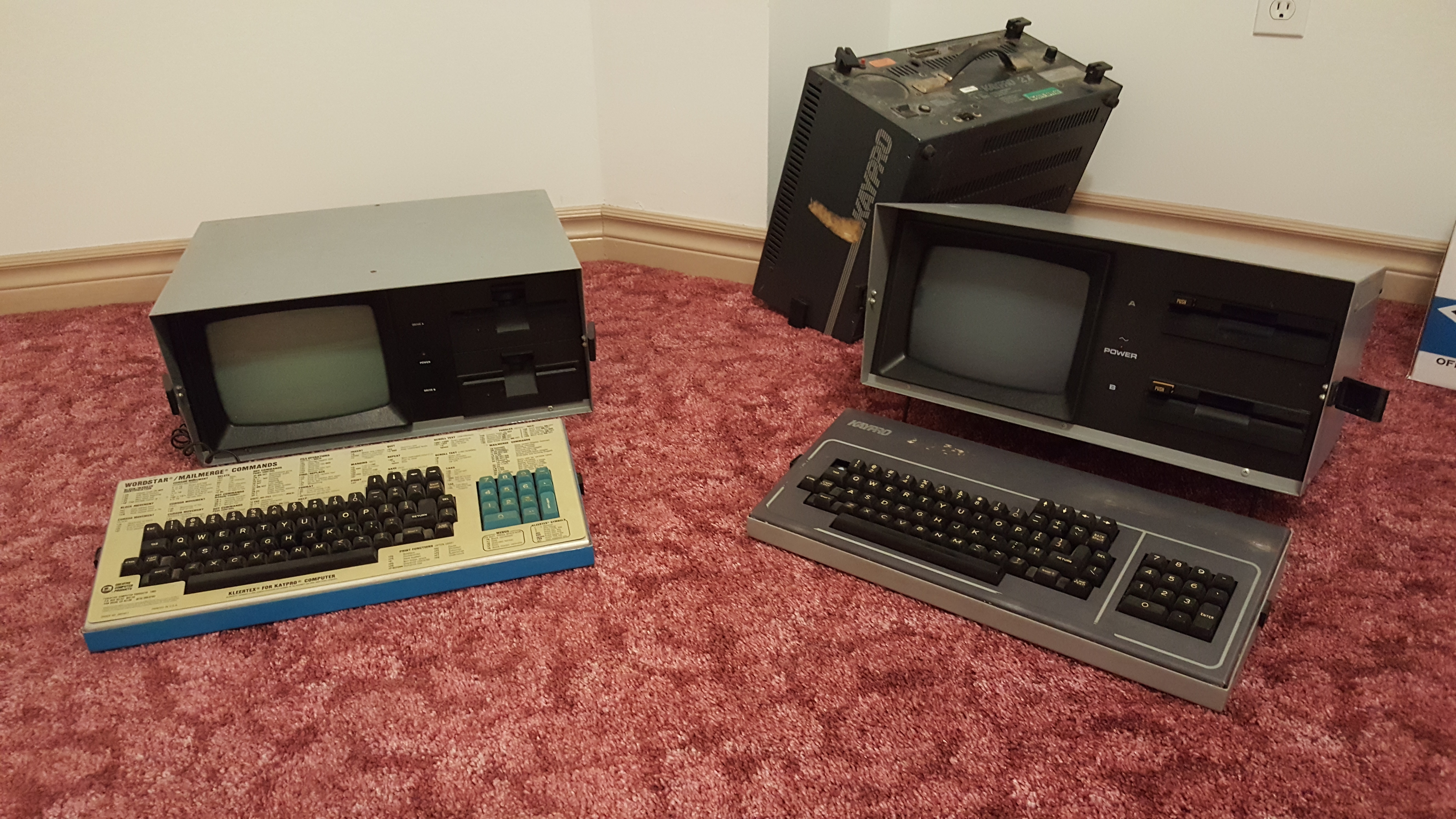 Kaypro II and 10 and a parts/incomplete one in the back.
