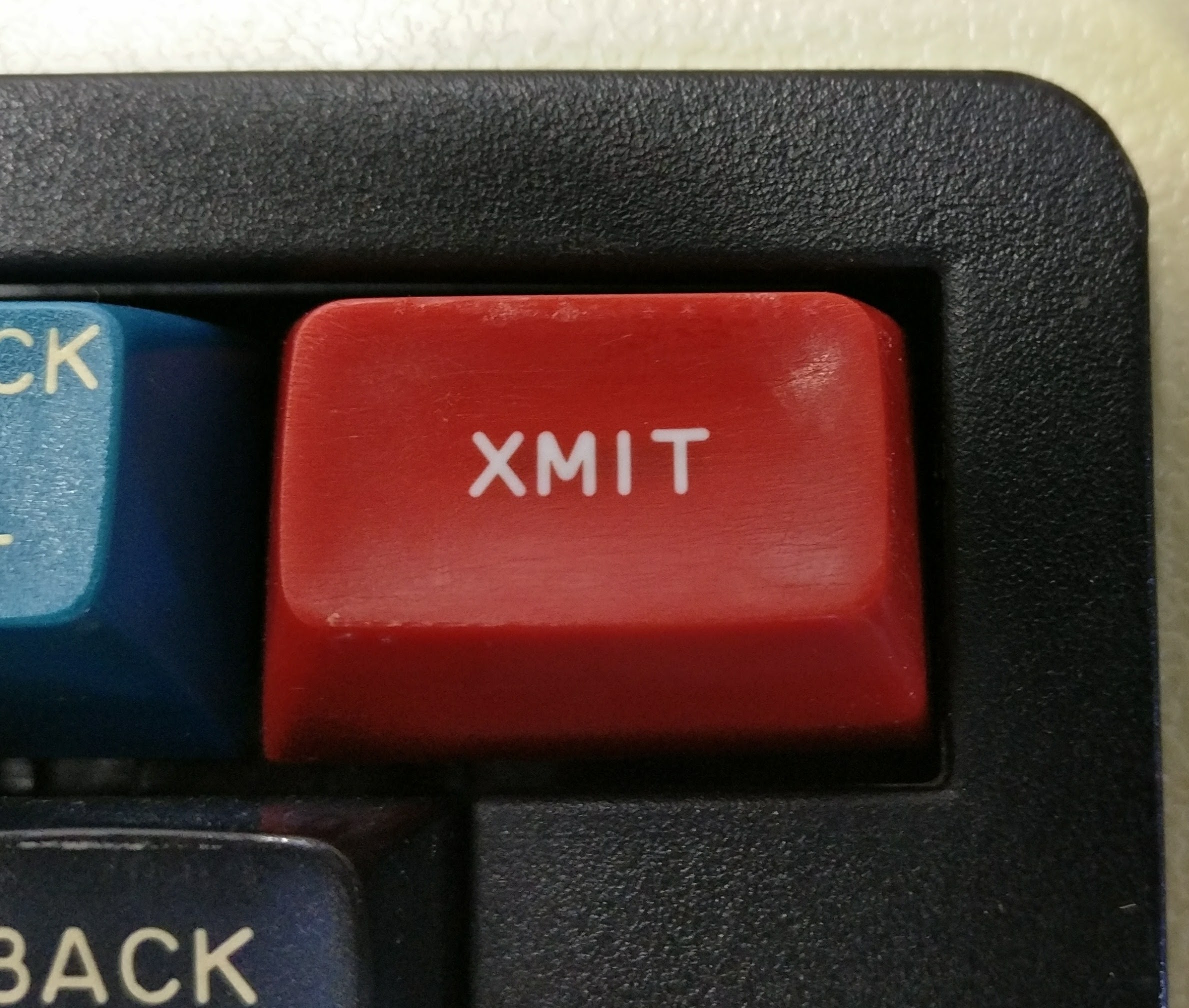 The original XMIT key, closer to its original condition.