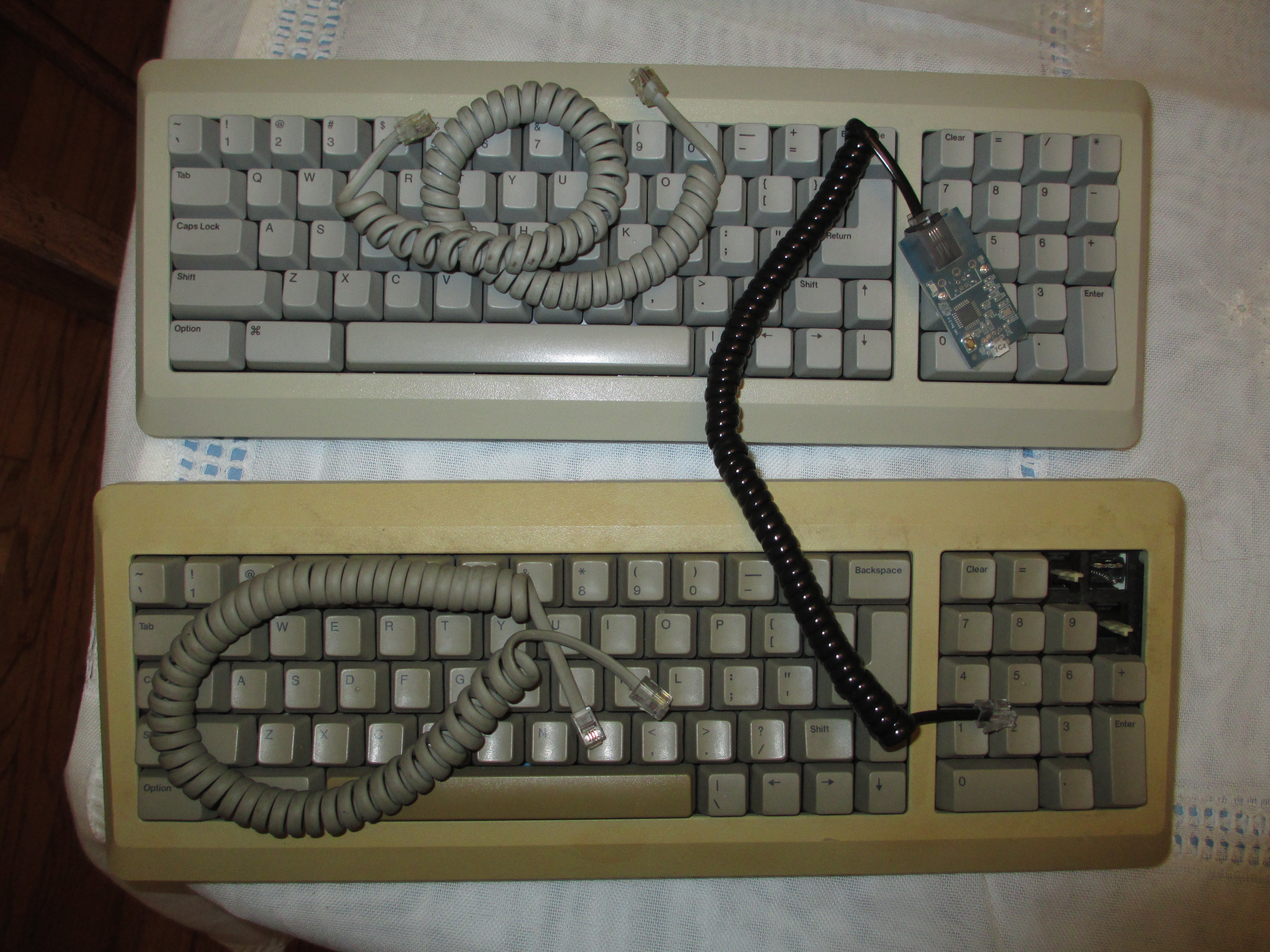 Well preserved Apple M0110A and poorly preserved Apple M0110A.