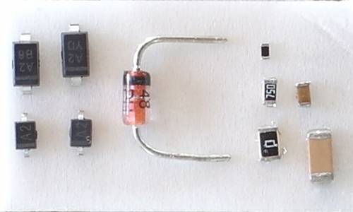 Top left SOD-123, Bottom left SOD-323, middle DO-35, Top right 0402, middle right 0603.