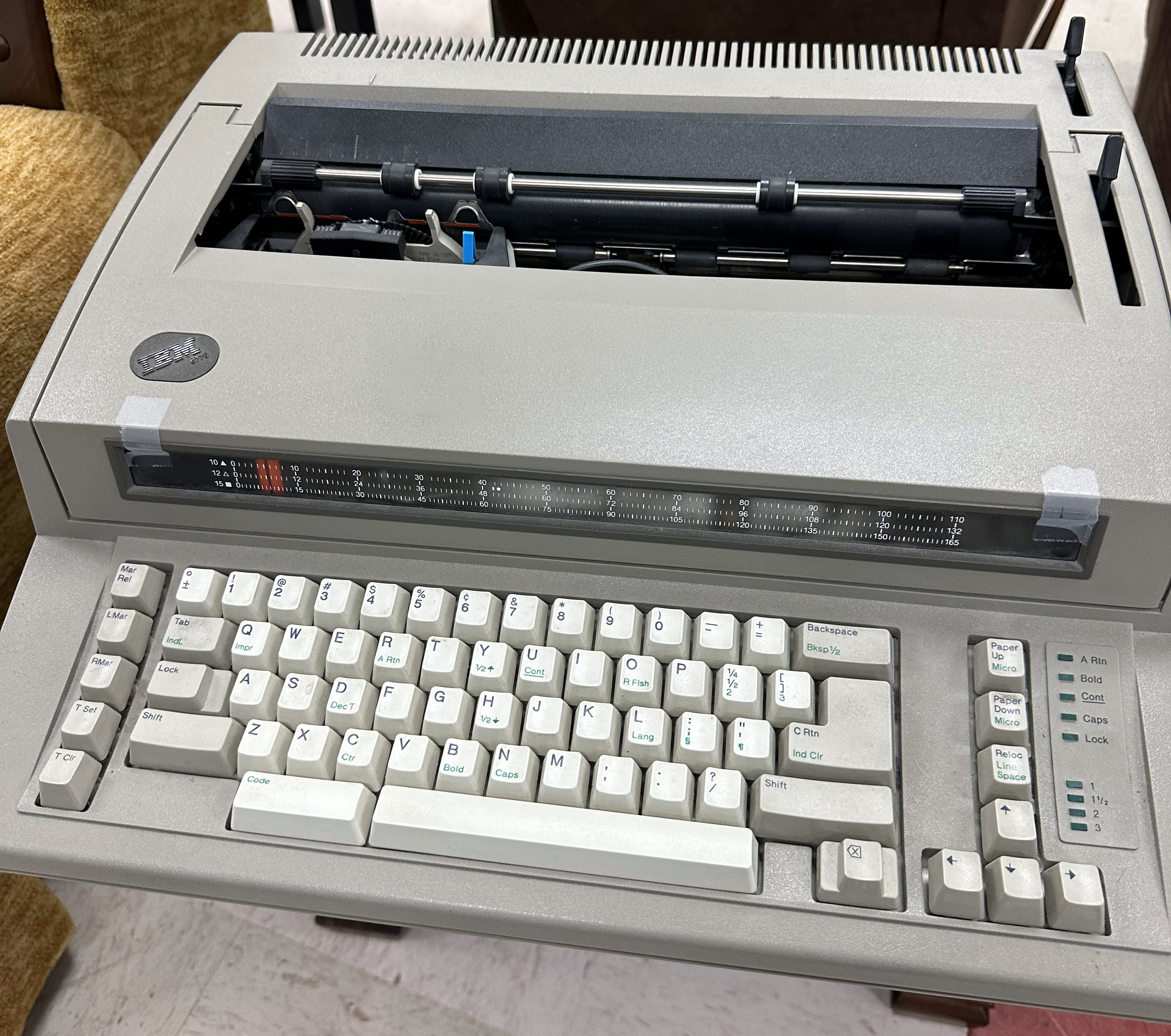 IBM 6779 typewriter in a light &quot;military olive drab&quot; colorway. Best guess on the mfg date is 1989. I don't use it as much as the WW3S2, but it's an interesting machine.<br /><br />.